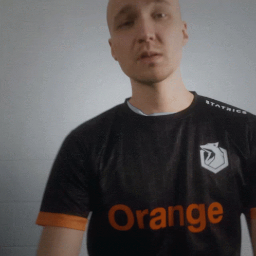 Man in Black Shirt Saying Orange