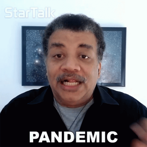 Man in Black Shirt Saying Pandemic