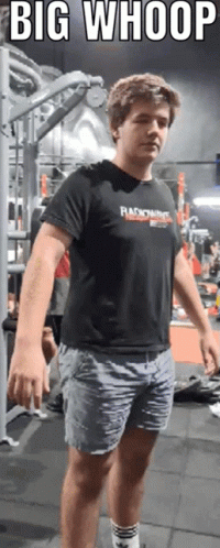 Man In Black Shirt Saying Radioactive In Gym GIF