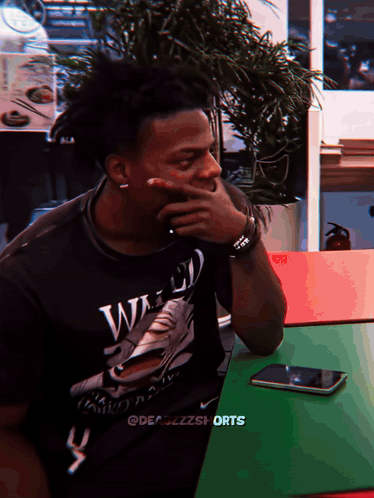 Man In Black Shirt Saying Weed GIF