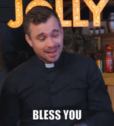Man In Black Shirt Says Bless You GIF