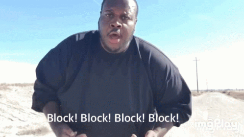 Man in Black Shirt Says Block