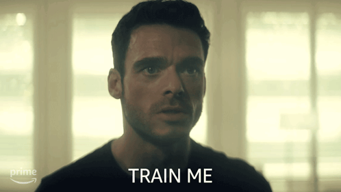 Man in Black Shirt Says Train Me in Front of Prime Logo