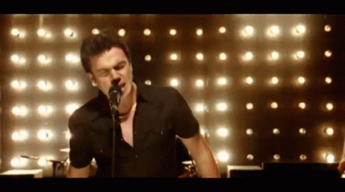 Man In Black Shirt Singing GIF