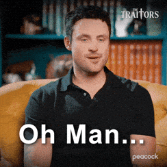 Man In Black Shirt Sitting On Yellow Couch Saying Oh Man GIF