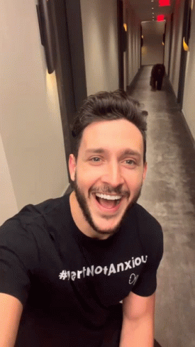 Man In Black Shirt Smiling #Larinotanxiou GIF