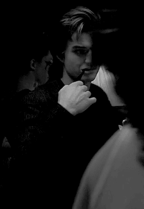 Man in Black Shirt Smoking Pipe Black and White