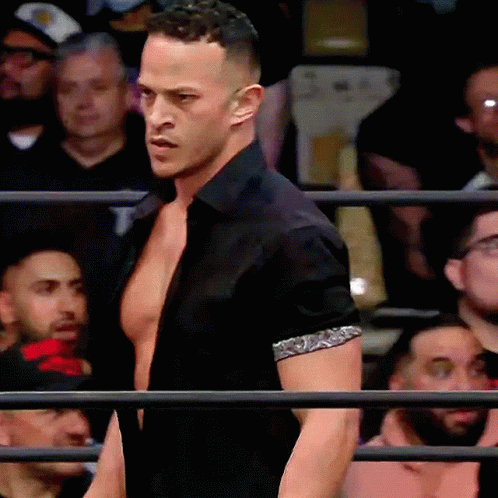 Man In Black Shirt Standing In Ring GIF