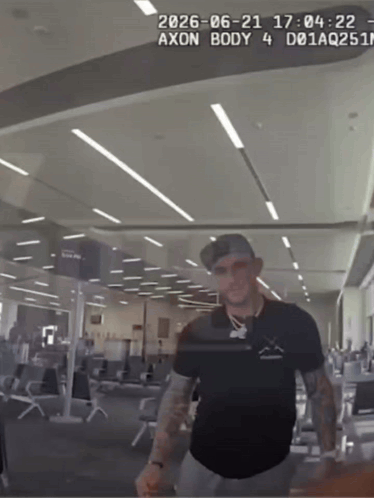 Man in Black Shirt Standing With Axon Body 4