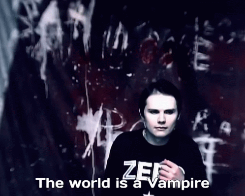 Man in Black Shirt The World Is a Vampire