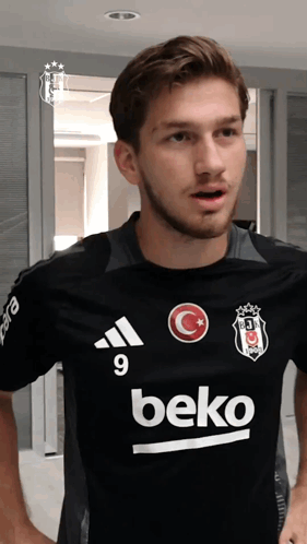 Man in Black Shirt with Beko