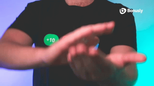 Man In Black Shirt With Green Bonusly Sticker GIF