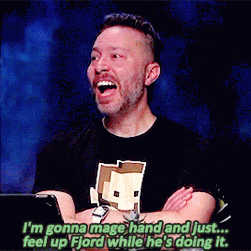 Man In Black Shirt With Minecraft Logo Laughing GIF