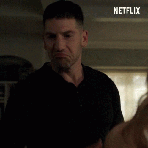 Man in Black Shirt with Netflix Logo