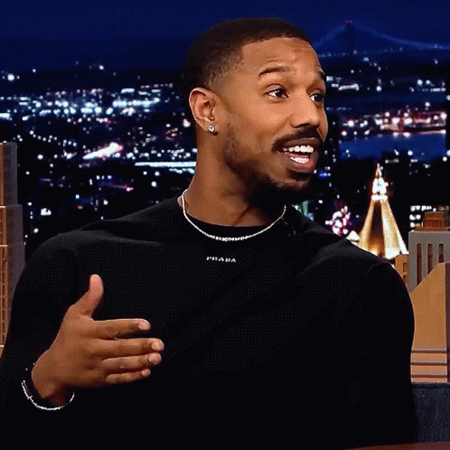Man In Black Shirt With Prada GIF