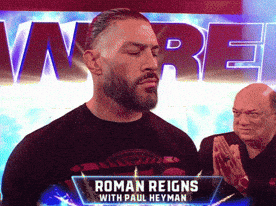 Man In Black Shirt With Roman Reigns GIF