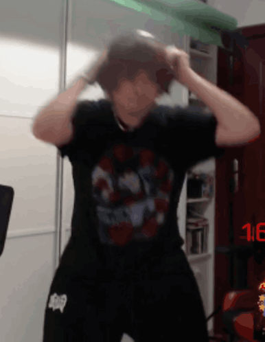 Man In Black Shirt With Skull Dancing GIF
