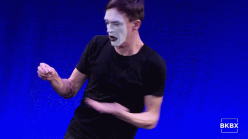 Man In Black Shirt With White Face Paint GIF