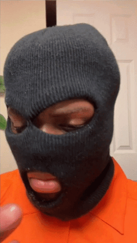 Man in Black Ski Mask With Hole