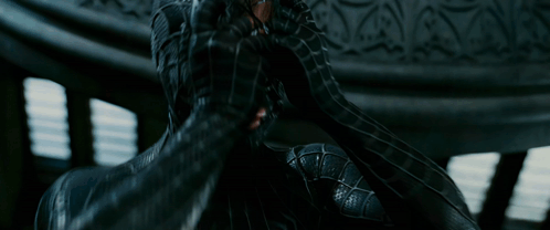 Man in Black Spider-Man Suit Covered in Venom