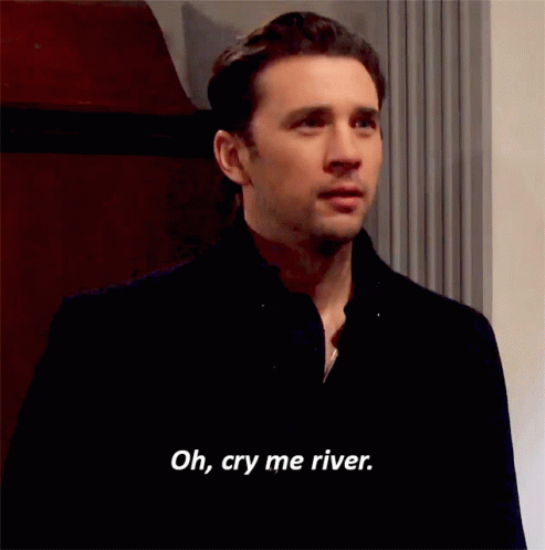 Man In Black Suit Cry Me A River GIF