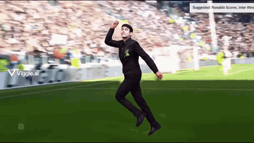 Man in Black Suit Jumping on Soccer Field