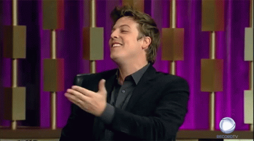 Man in Black Suit Laughing
