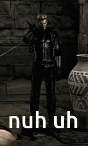 Man in Black Suit Standing by Vase Saying Nuhuh