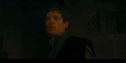 Man In Black Suit Standing GIF