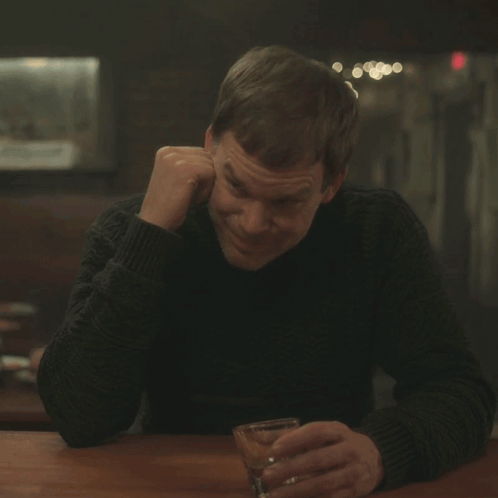 Man In Black Sweater Holding Whiskey Saying Yeah Okay GIF