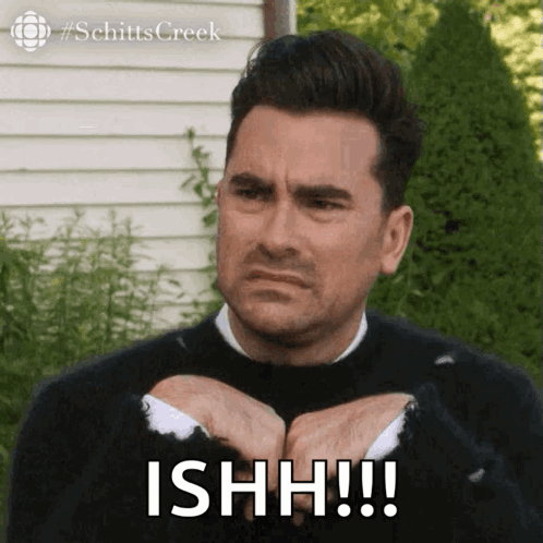 Man in Black Sweater Making Funny Face