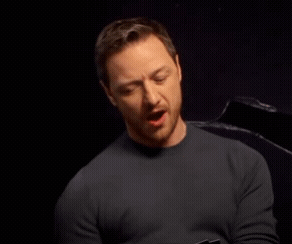 Man In Black Sweater Making Funny Face GIF