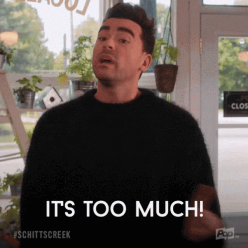 Man in Black Sweater Says It's Too Much