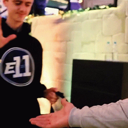 Man in Black Sweatshirt With Number 11
