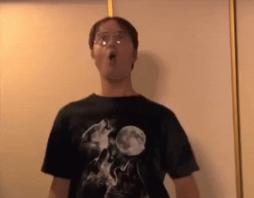 Man In Black T-Shirt Howling Wolf GIF