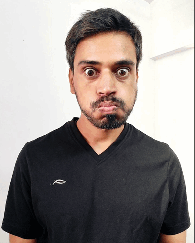 Man in Black T-Shirt Making a Face