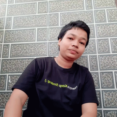 Man In Black T-Shirt Saying Gnilm2 GIF