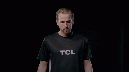 Man in Black T-Shirt Saying TCL