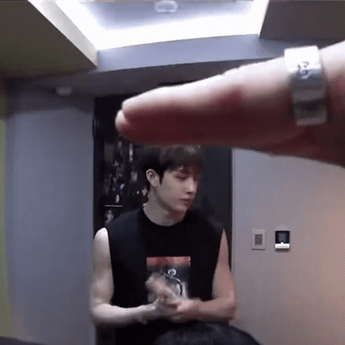 Man In Black Tank Top And Silver Ring GIF