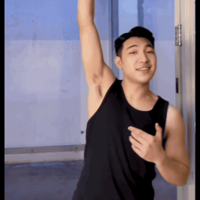 Man In Black Tank Top Arm Raised GIF