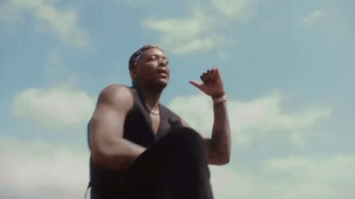 Man in Black Tank Top Fist Pump