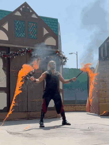 Man In Black Tank Top Holding Fire Stick GIF