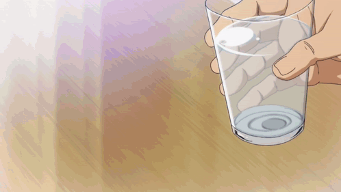Man In Black Tank Top Holding Glass GIF