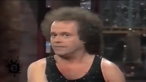 Man In Black Tank Top Making Funny Face GIF