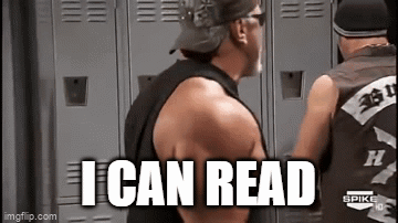 Man in Black Tank Top Reading