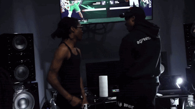 Man In Black Tank Top Saying S.com GIF