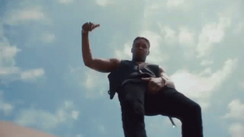 Man in Black Tank Top Standing