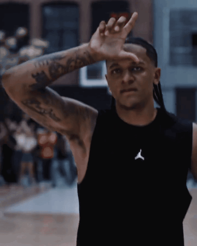 Man In Black Tank Top With Jordan Logo GIF