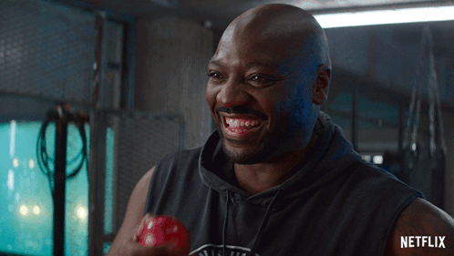 Man In Black Tank Top With Netflix GIF