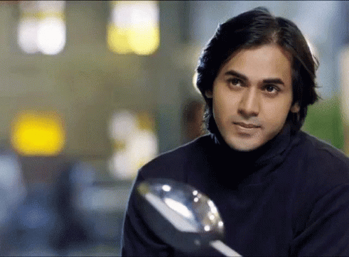 Man In Black Turtleneck Looking GIF